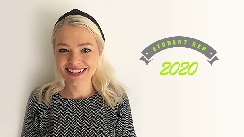 Emma Kinley next to banner reading student representative 2020